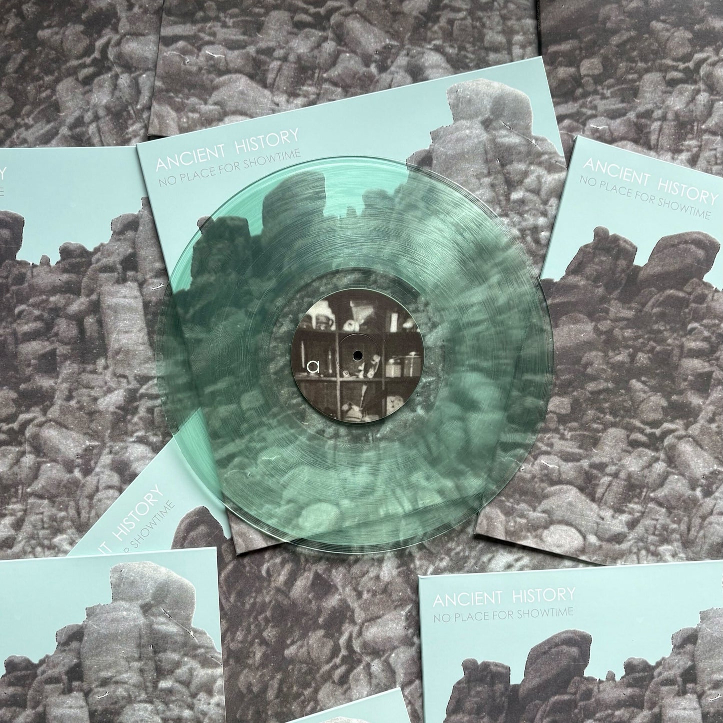 Coke bottle clear vinyl record with a full color printed sleeve and full color printed center labels