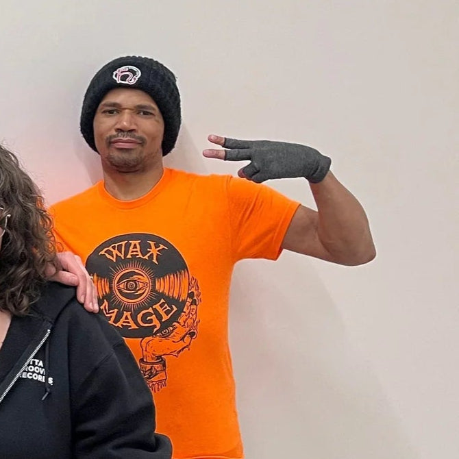 Buscrates wearing a Hellbender Vinyl beanie