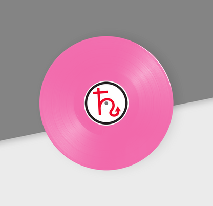 A pink 12-inch vinyl record with a black and white label in the center, placed on a gray and white background.