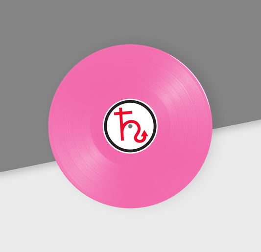 A pink 12-inch vinyl record with a black and white label in the center, placed on a gray and white background.
