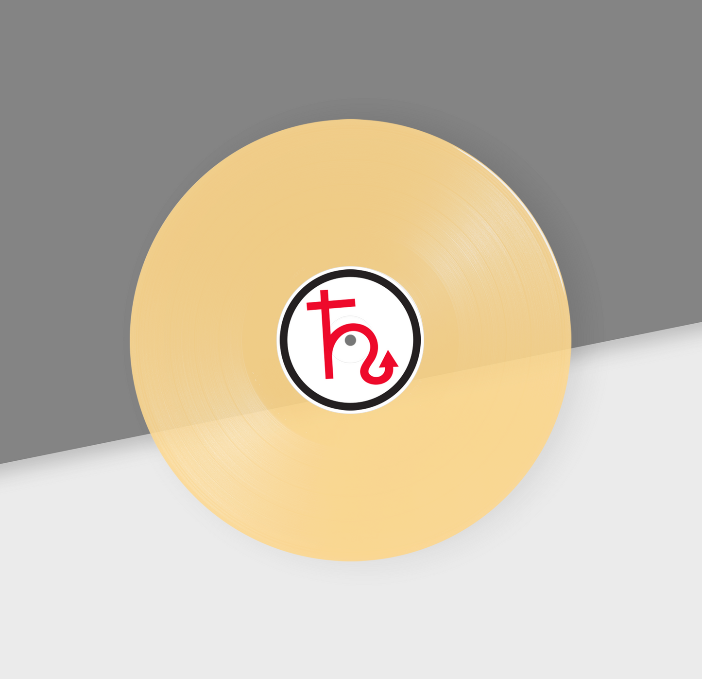 A 12-inch transparent hazy orange vinyl record with a black and white center label featuring a red letter 'H' logo.