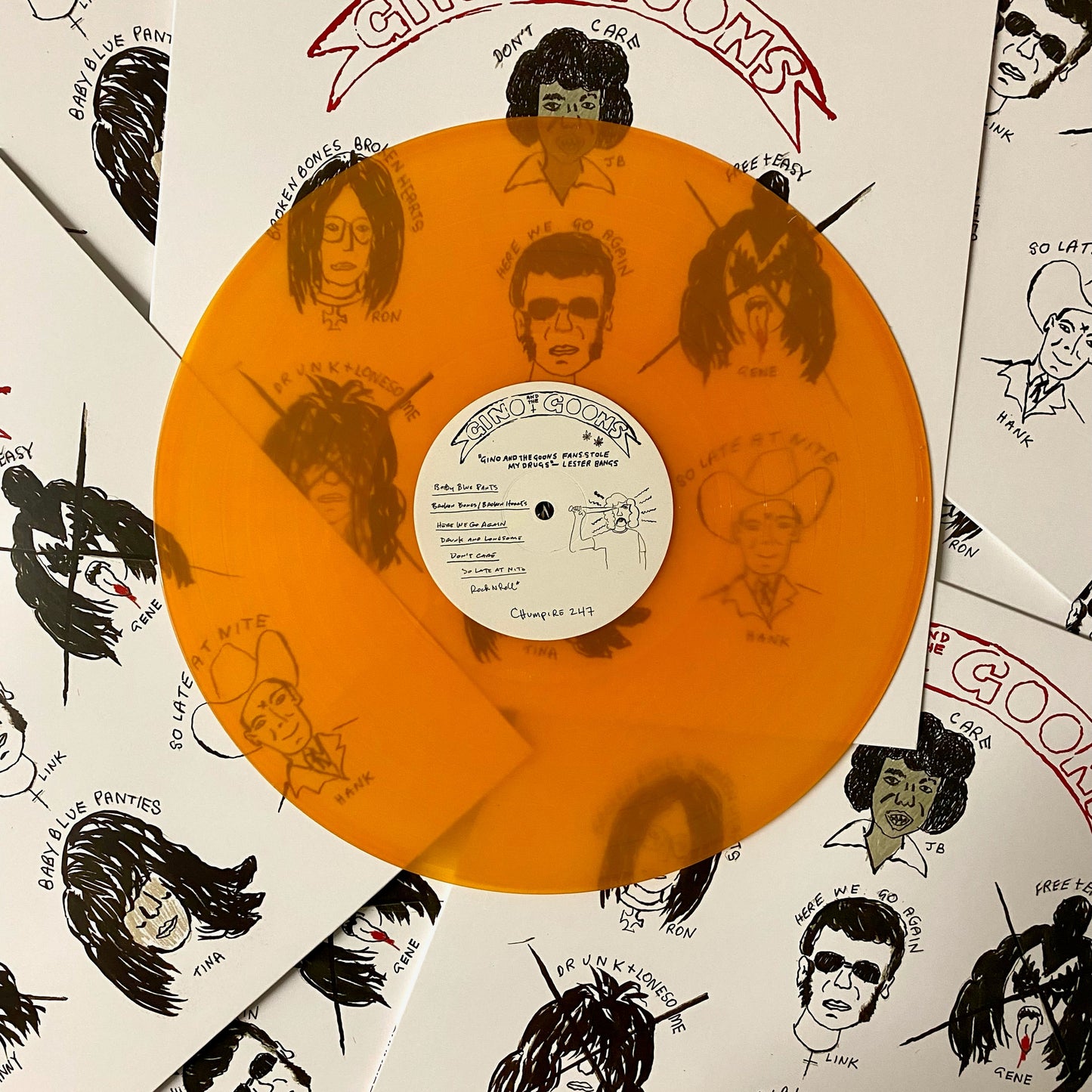 Clear/transparent hazy orange 12" vinyl record made for an independent band by Hellbender Vinyl