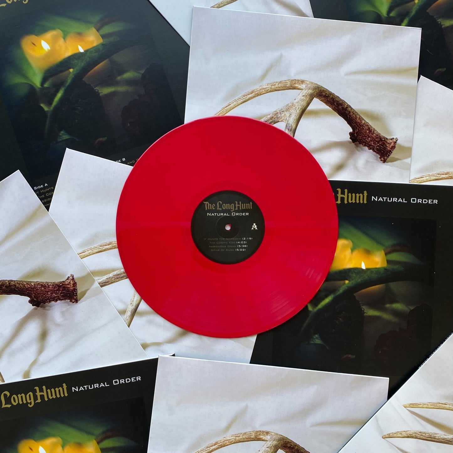 Solid/opaque red vinyl record made by Hellbender Vinyl