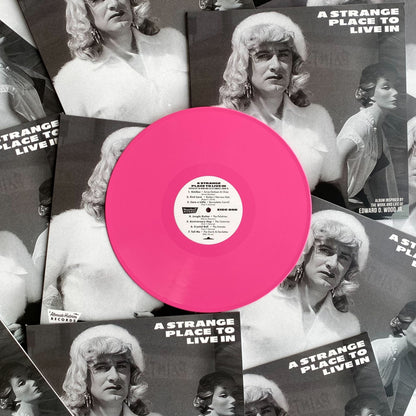 A 12" opaque pink vinyl record pressed by Hellbender Vinyl