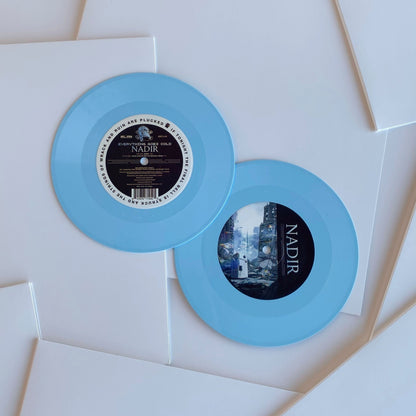 Examples of sky blue vinyl records made by Hellbender Vinyl